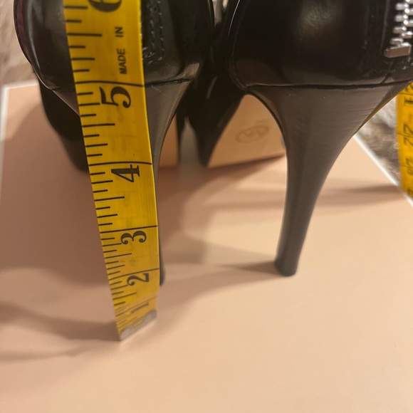 Michael Kors patent leather platform heels. Buckles and ankle height. 
Size 7M - Picture 11 of 16